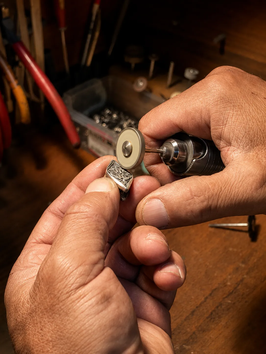 Silver detail being polished by hand to bring back its shine